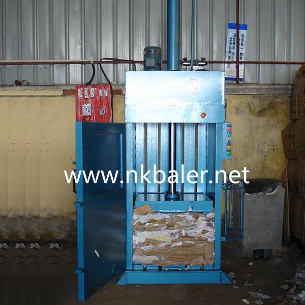 Trash compactor baler